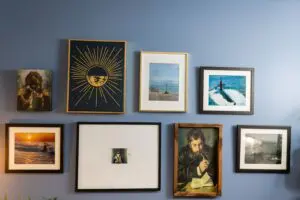 A wall with many different pictures on it